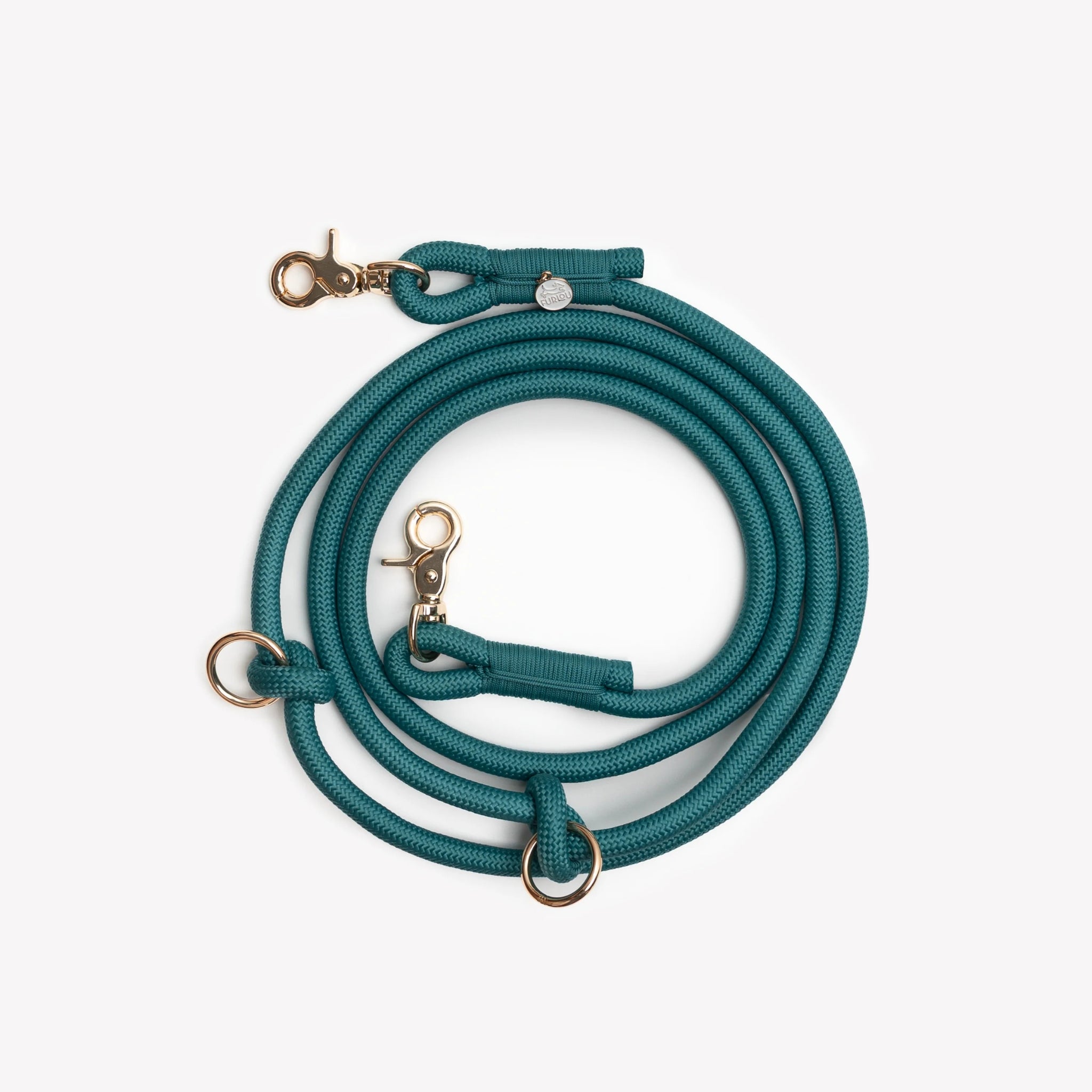 The blue hands-free braided leash by Furlou displayed in a neat coil, emphasizing the braided blue cord and secure hardware clasps.