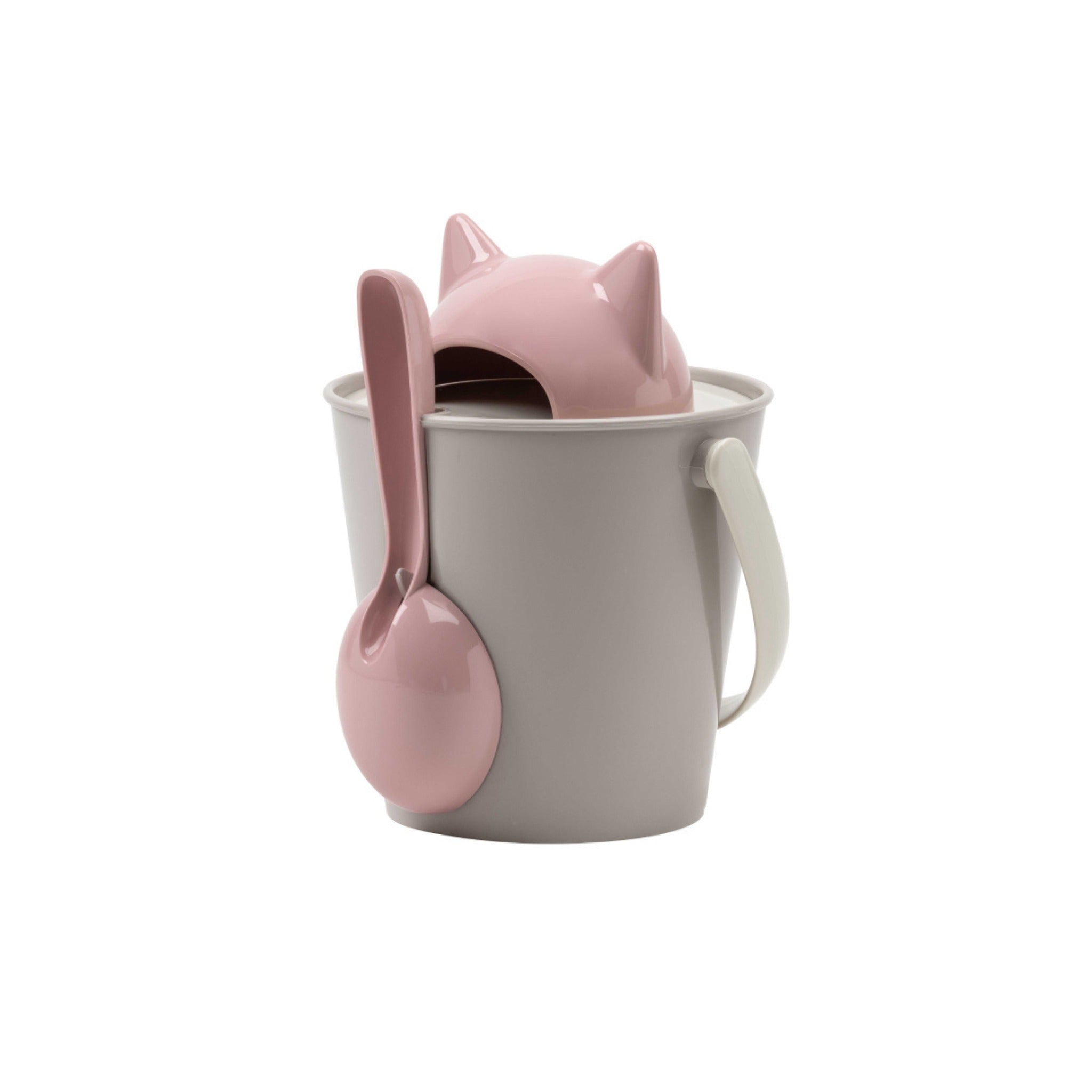 A side-angle studio view of the grey Crick cat food storage container, demonstrating how the pink measuring scoop slots securely onto the outer edge of the bucket below the pink cat lid.