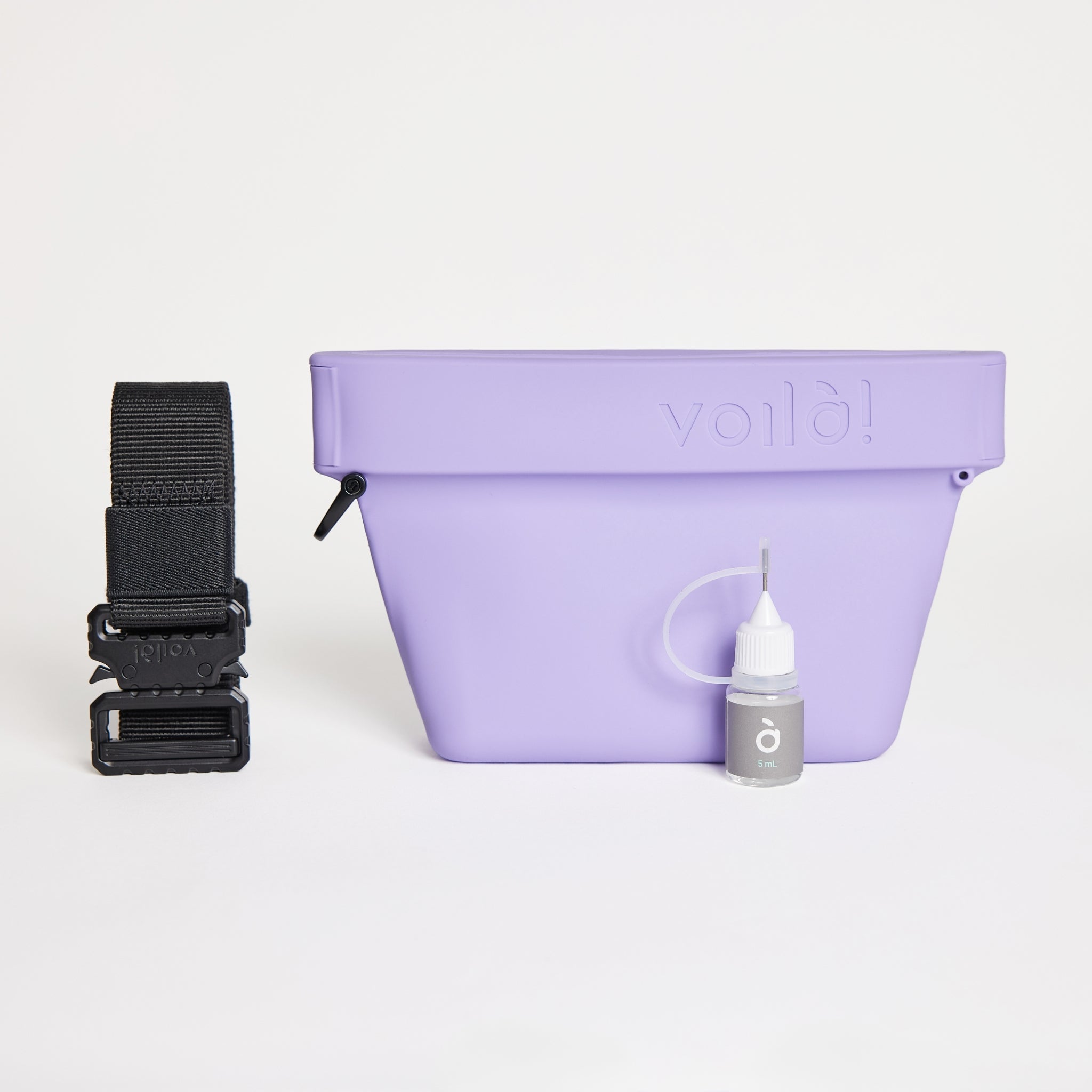 The complete lilac purple Voilapets Ultimate Treat Pouch The Mini set, including the silicone training pouch, heavy-duty black tactical belt buckle, and a maintenance oil bottle.